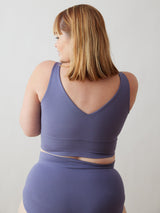 Low V cut back bra with compression and good chest support. Large band for higher coverage
