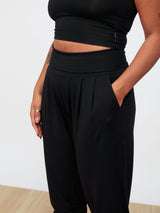 Classic front pleats and roll down waistband that doubles as a high waistband