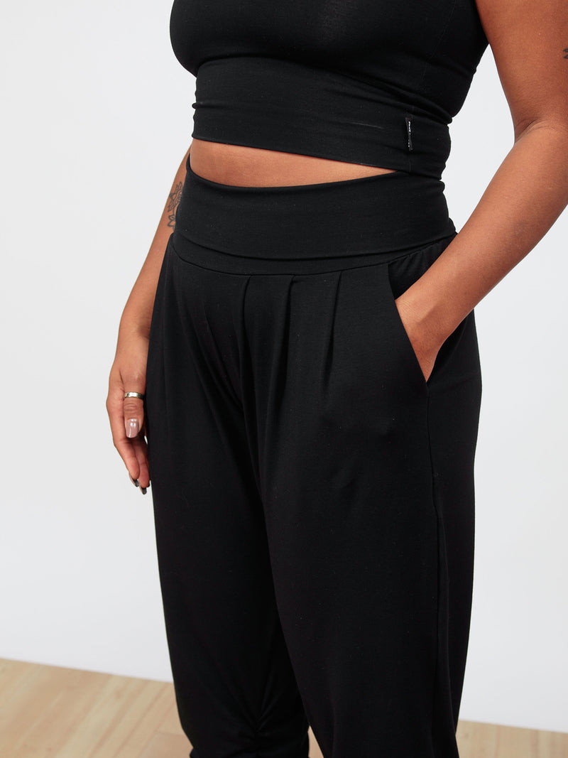 Classic front pleats and roll down waistband that doubles as a high waistband